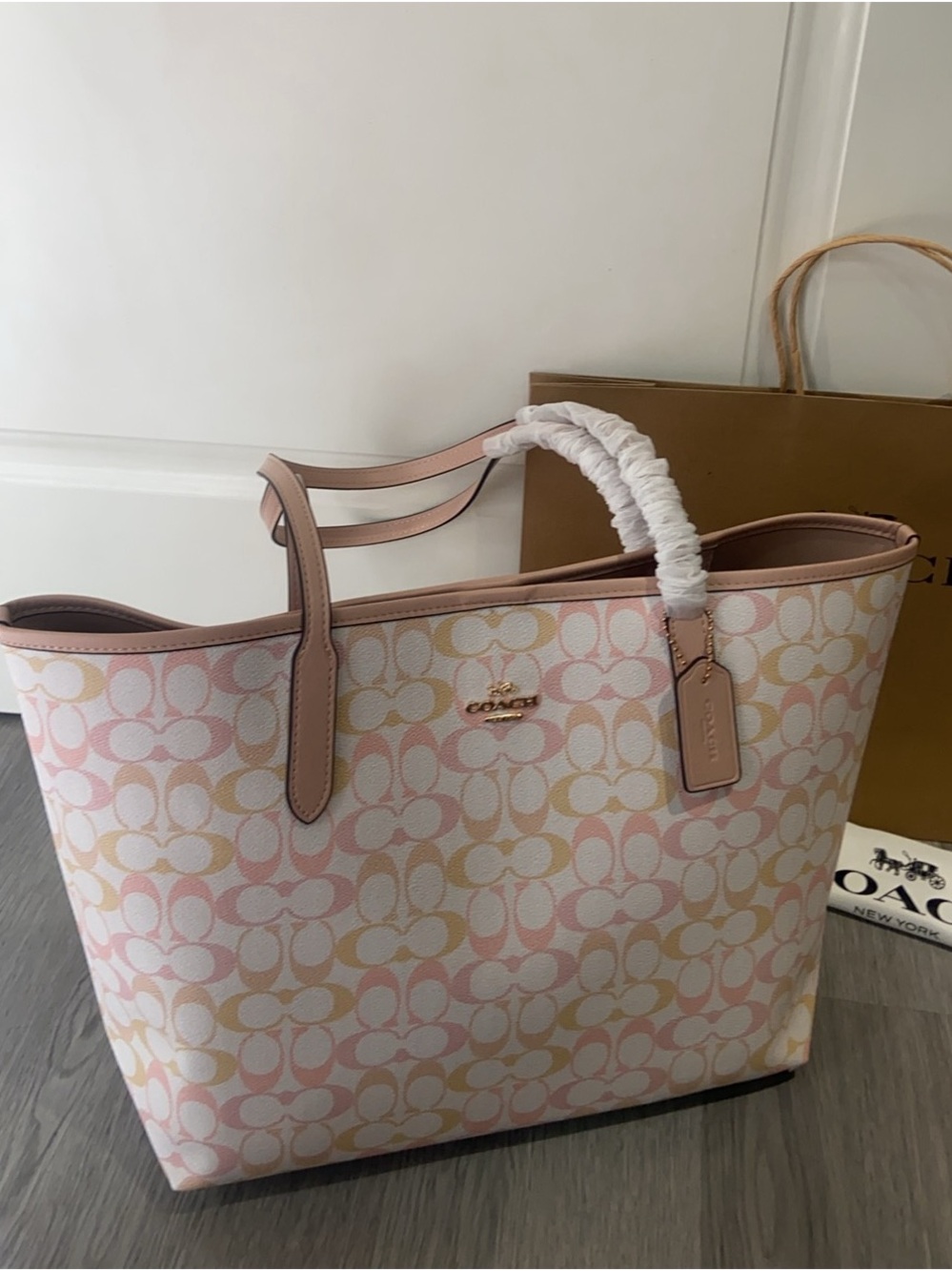 Coach Pink and Cream Signature Canvas Tote with Bear Charm - Picture 2 of 6